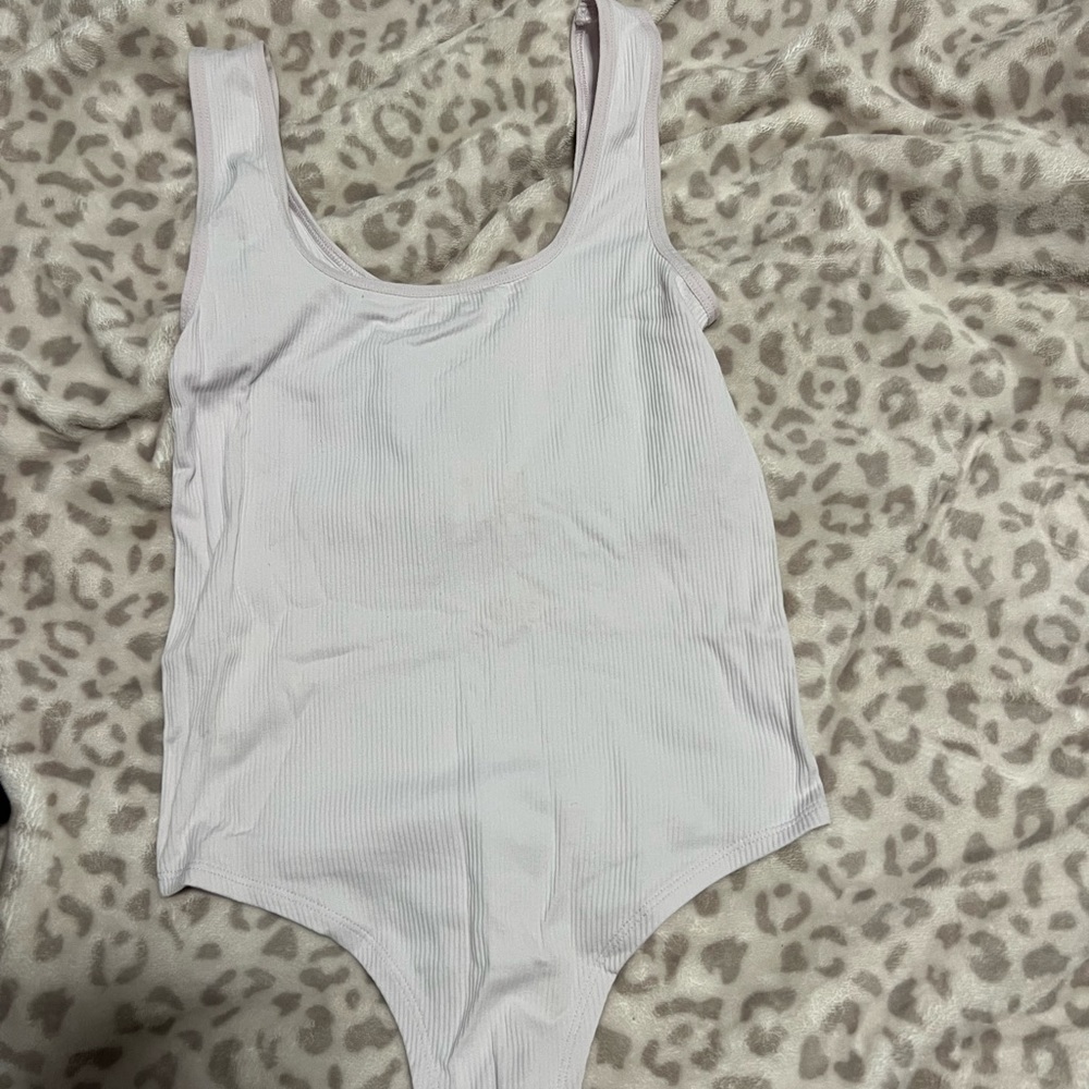 Light pink body suit thong.
